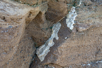 Caliche with Tuff, Tuff is a type of rock made of volcanic ash ejected from a vent during a volcanic eruption.  Oahu Hawaii geogoly. Diamond Head Crater, Honolulu Volcanics, calcium carbonate;