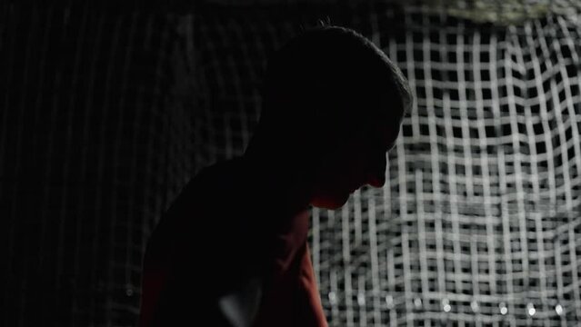 Cinematic Portrait Of Sportsman In Darkness, Silhouette Of Motivated Athlete Training Overnight