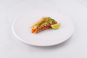 Gourmet tuna tartare with fresh herbs and lime