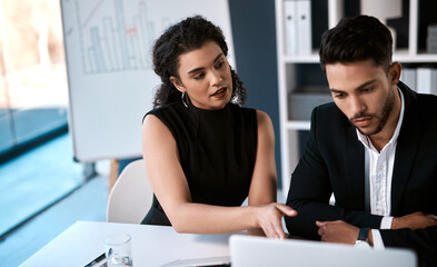 Business office, man and woman with laptop for brainstorming, project management and review of...