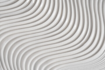 Naklejka premium White cream texture stroke composition background. Skincare cosmetic product swatch