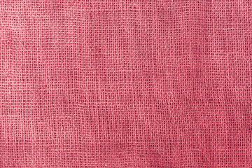 Fototapeta premium texture fabric burlap for sewing red background color macro