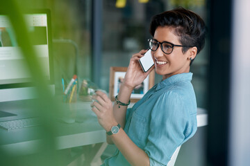 Creative, girl and phone call with smartphone in office for communication on website development...