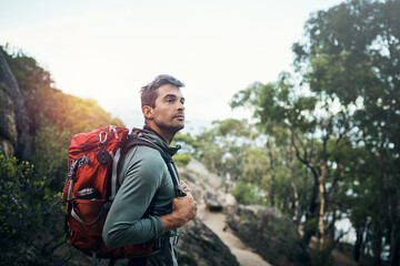 Hiking, thinking or fitness man with backpack in forest for wellness, peace and morning cardio in...