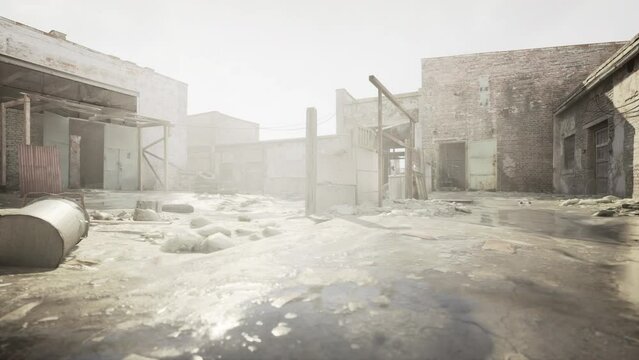 abandoned factory area with destroyed buildings and piles of garbage on the ground