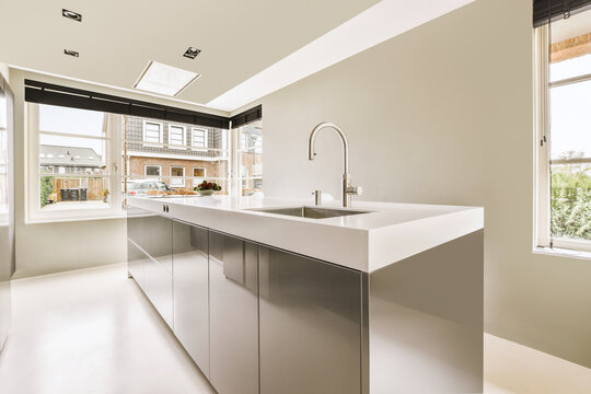 Modern kitchen design in Amsterdam home, sleek and functional