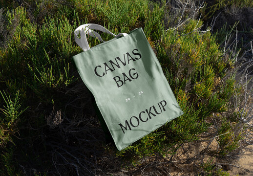 Canvas Bag Lying on the Tree Mockup