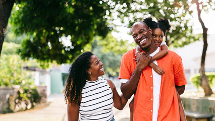 Happy Black Family Enjoying a Fun Day Together Outdoors