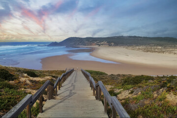 Fototapeta premium Scenic Boardwalk to Amoreira Beach, Portugal
