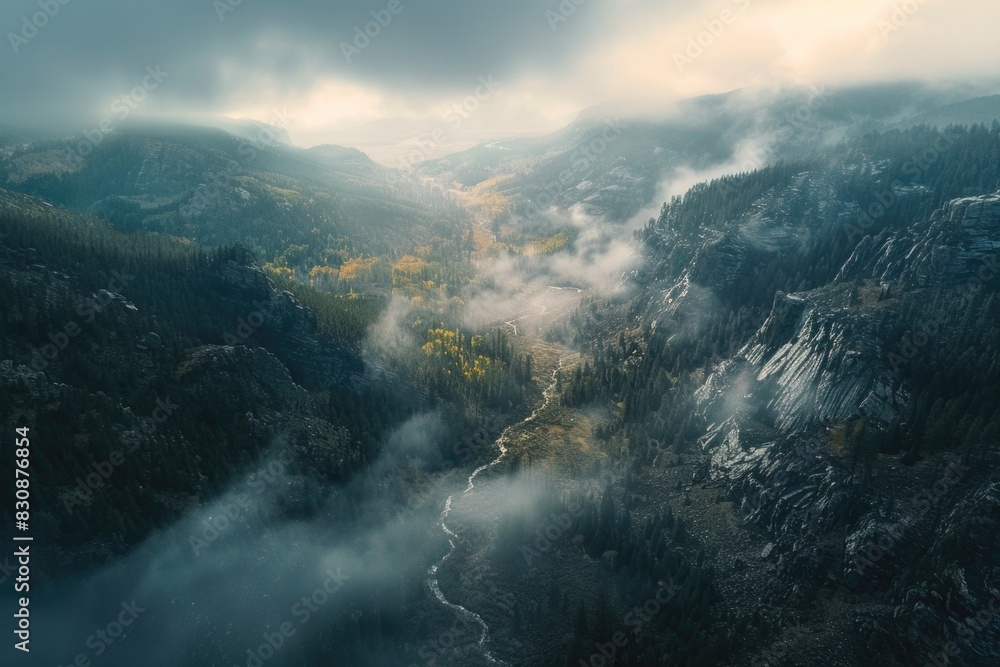 Poster scenic aerial view of a mountain landscape with a river flowing through it. ideal for travel and nat