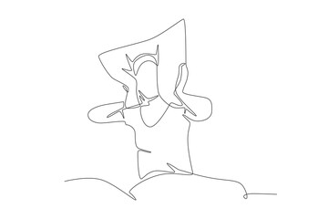 Woman having trouble sleeping covers her ears with a pillow. Struggling to sleep concept one-line drawing