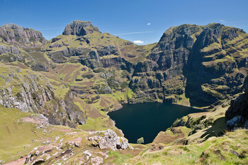 The quiet beauty of nature: a small lake located among picturesque small mountains. An ideal choice for advertising tourism services, environmental events and sports tourism. Lots of space for text