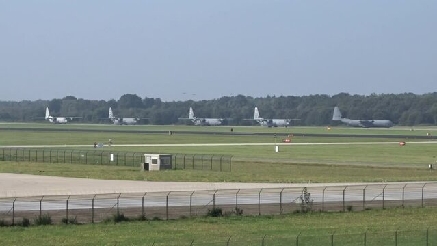 Military Airplanes Taxiing at Air Base for Mission
