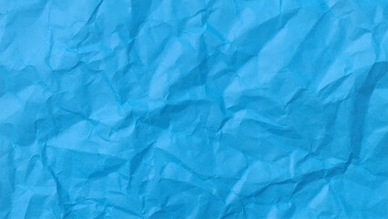 Obraz premium Blue background and wallpaper by crumpled paper texture and free space.
