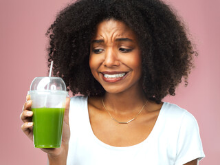 Disgust, wellness and woman with green juice for detox, nutrition or health weight loss diet....