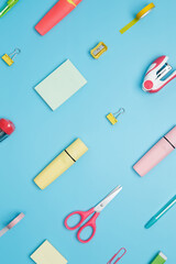 Various school office  on blue background. Back to school concept. Top view