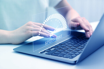 Speed test. Woman using laptop at table, closeup. Virtual screen over device