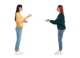 Two women talking on white background. Dialogue
