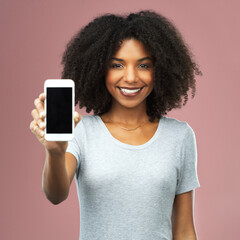 Phone, screen and portrait of woman in studio for advertising, information or digital notification. Happy, female person and tech with mockup for elections, registration or website on pink background