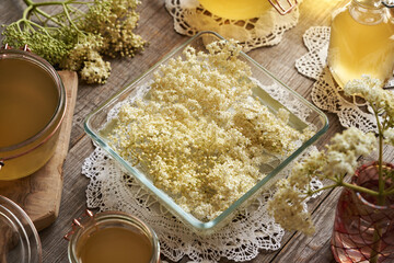 Prepration of herbal syrup by macerating fresh elderberry flowers in water