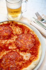 Classic Pepperoni Pizza and Beer