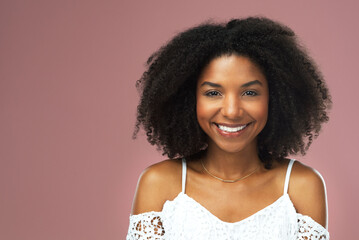 Afro, haircare and portrait of black woman, smile and studio for hairstyle, growth and texture of...