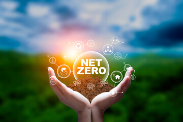 Net zero, carbon neutrality, Renewable energy concept. Net zero and Green energy icon around it at...