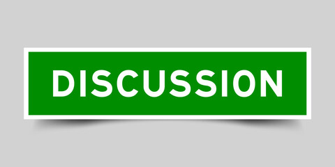 Green color square label sticker with word discussion that inserted in gray background