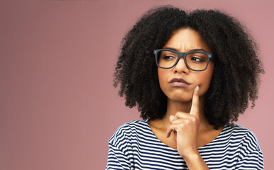 Thinking, confused and girl with glasses in studio for solution, planning or asking gesture on pink...