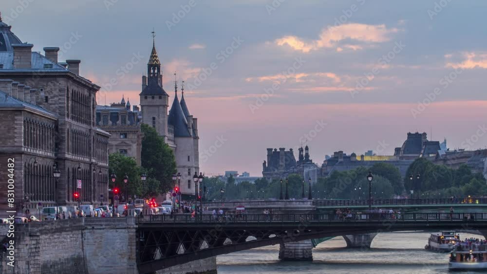 Wall mural le pont d'arcole bridge after sunset with boats day to night transition timelapse, paris, france, eu