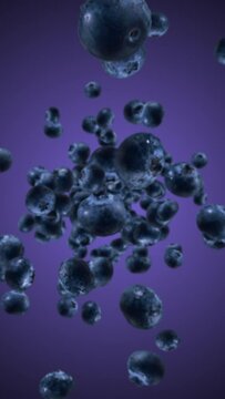Raw juicy blueberries exploding and flying in super slow motion. Blueberry drops after explosion. High speed 1000fps vertical video