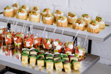 Delicacies and snacks on a buffet or banquet. Catering.	