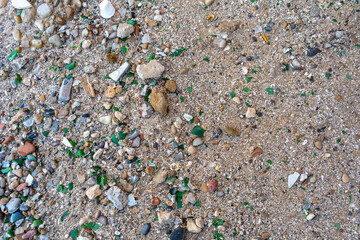 Microplastics on Sand Beach. Micro Plastics Garbage, Tiny Trash Pieces, Microplastic Waste, Dirty...