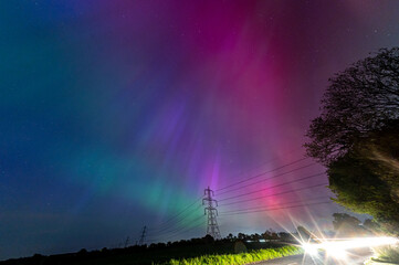 Looking up for the northern lights, aurora borealis, from Stansted, Essex, UK. The lights were...