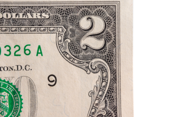 Part of a 2 paper dollar macro shot.