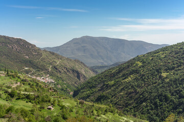 Mountain scenery of the Alpujarra Granadina with a small white village