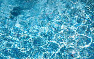 Background of blue water in the pool.