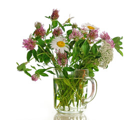 A bouquet of wildflowers in a mug