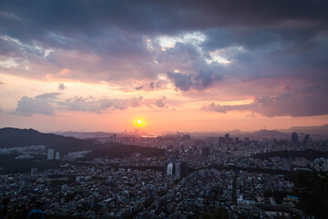 Seoul City skyline and downtown and skyscraper in sunset There is Namsan Mountain and the Han River in the background, Seoul, South Korea.