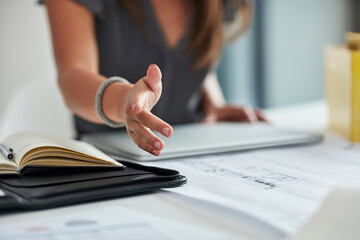 Table, businesswoman and handshake or welcome in office for greeting, b2b deal and agreement. Impression, female worker and hr manager with hand gesture, introduction and thank you in workplace