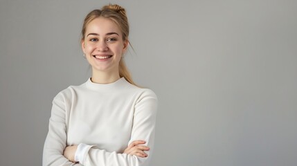 Studio Portrait Of Smiling Young Businesswoman With Folded Arms Against Plain Background : Generative AI