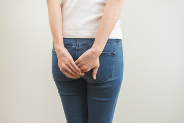 Health care, pain asian young woman suffering from hemorrhoid, anus, diarrhea and constipation,...