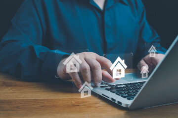 Real estate investment concept. buy house, Man touch virtual house icon for analyzing mortgage loan...