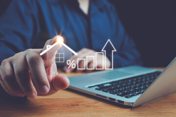 Real estate investment concept. buy house, Man touch virtual house icon for analyzing mortgage loan...