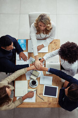 Group, hands and pile for collaboration, above and together for unity in project, women and man in office. Workplace, investor and teamwork of employees, notebook and tech for research and notes