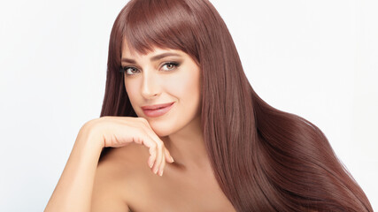 Naklejka premium Beautiful model with long healthy hair posing on white background
