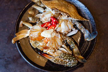 pickled fresh crab marinated in fish sauce on plate in a restaurant © narongcp