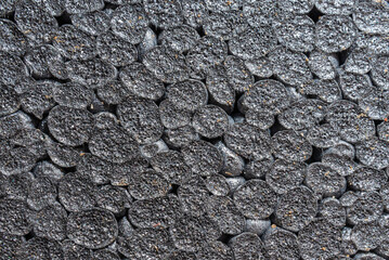 expanded polystyrene board eps with graphite macro shot, background.