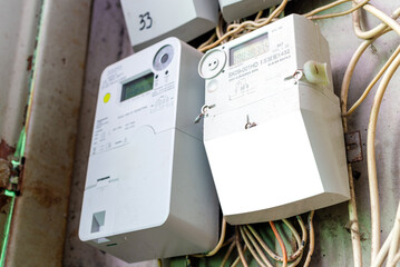 White blank mockup, advertisement. Household electricity meter in the apartment building.