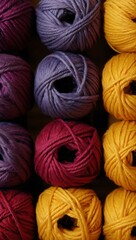 Purple and Yellow Balls of Yarn